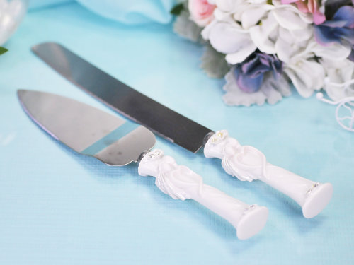 Набор приборов для свадебного торта Молодожены Набор приборов для свадебного торта: нож + лопатка, длина лезвия ножа - 33см