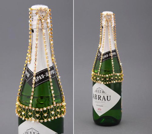 Украшение для шампанского 802-001  Украшение на бутылку шампанского из страз. Очень нарядное сверкающее украшение, им можно нарядить шампанское, которое оставляют на годовщину или на первенца.